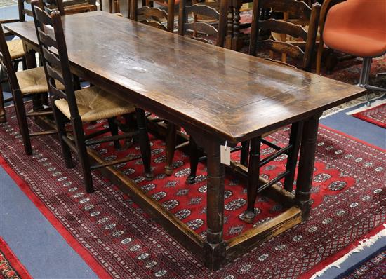 A late 18th century oak refectory table w.228cm